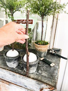 Make sure to measure your stick to the height you wish your DIY Topiary to be.  