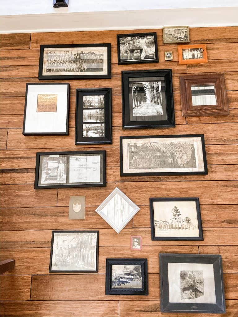 Lay your actual photos out on the floor to get a visual and make sure your gallery wall is in a pleasing arrangement.  
