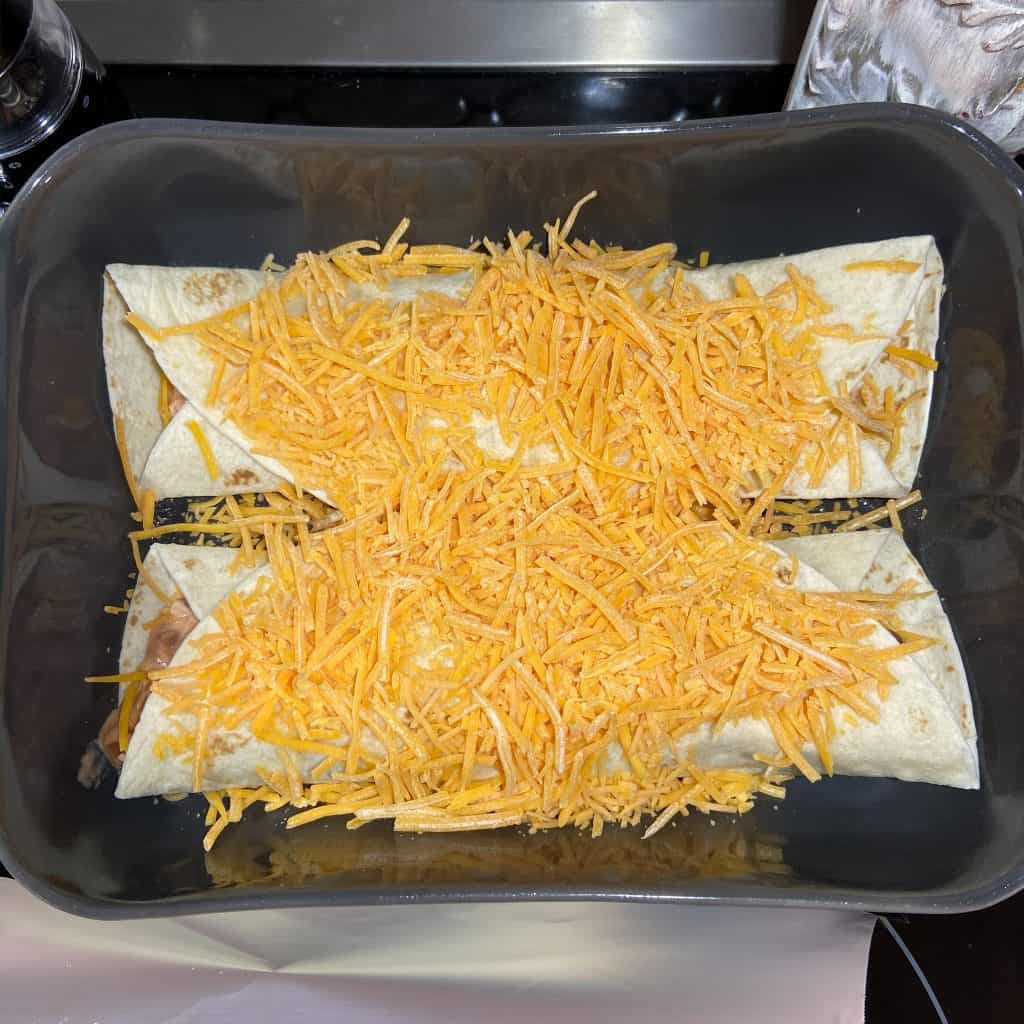 Easy Enchiladas with Chicken for a fast and simple meal.  Feeds 8 easily and freezes well.   