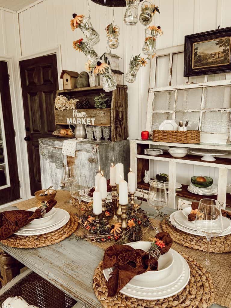 Black Eyed Susan's and Simple candlesticks add a cozy feel to this late summer table.  