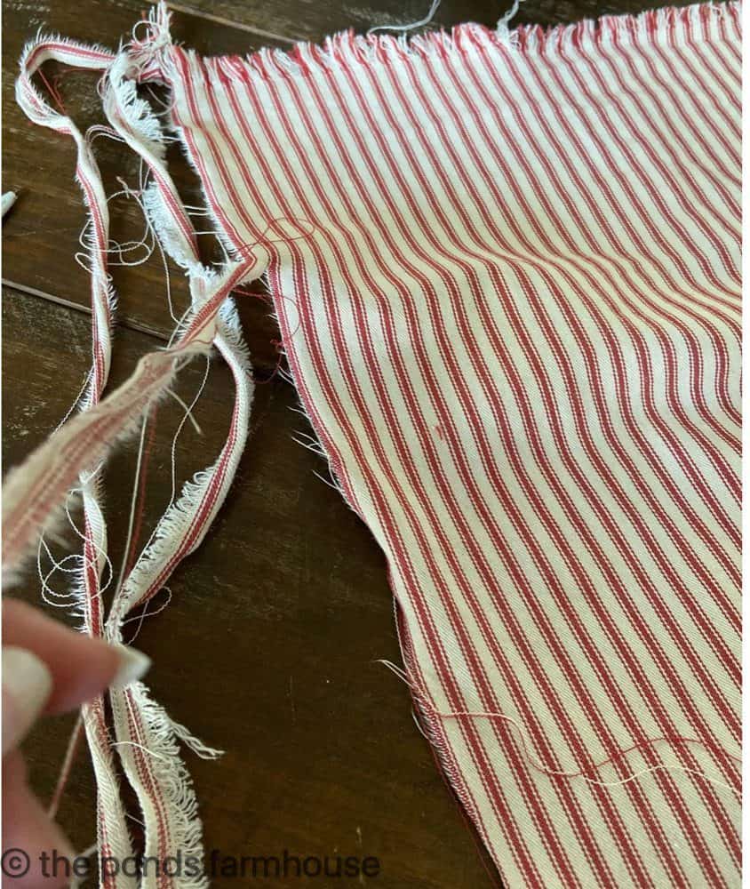 Strip fabric into small pieces for tassel decoration ideas