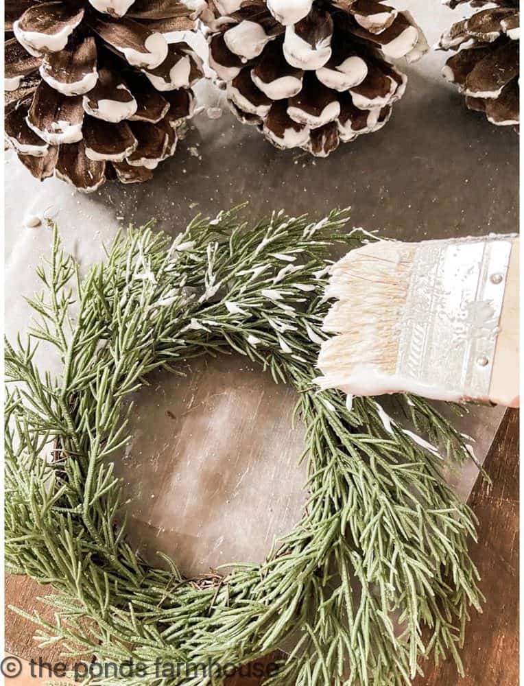 Add fake snow to the wreaths and pinecones for Christmas Decorating ideas