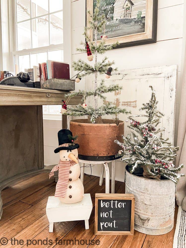Add a snowy look to small Christmas Trees with easy DIY 2 Step DIY Flocking Technique for holiday decorating