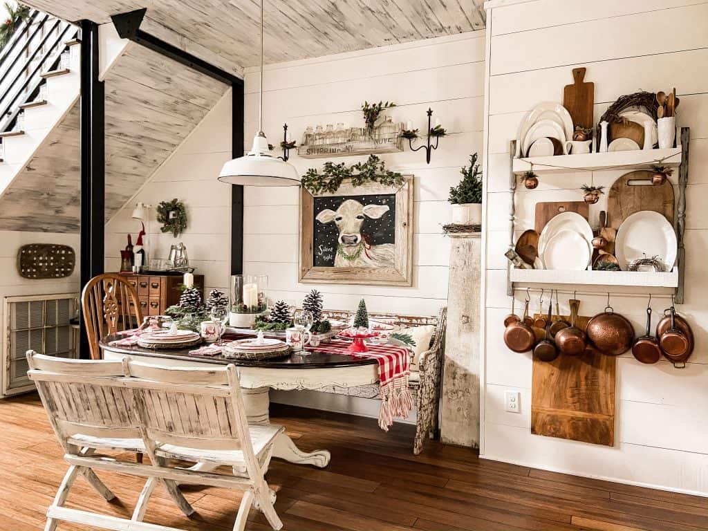Vintage inspired Christmas Farmhouse Style dining.  Repurposed holiday décor, diy Christmas projects, cow painting, farmhouse table