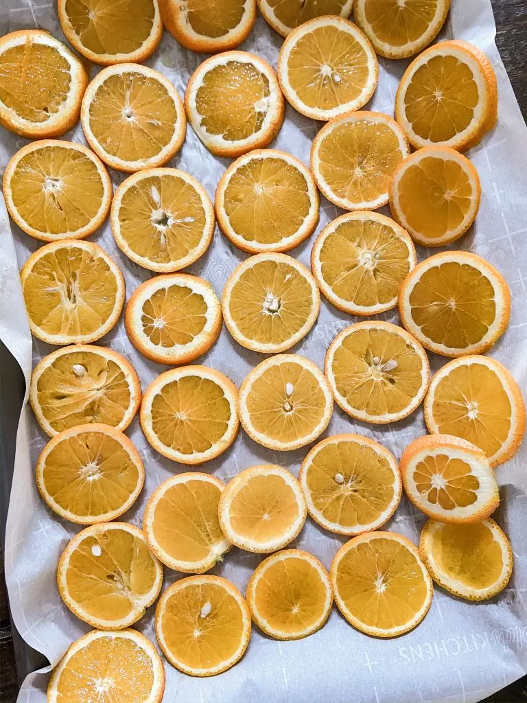 Slice Oranges to make dried fruit garland
