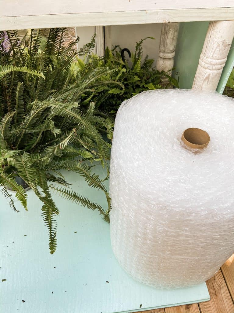 Use Plastic Wrap to insulate plants on extreme cold areas to overwinter ferns and the overwintering of geraniums. 