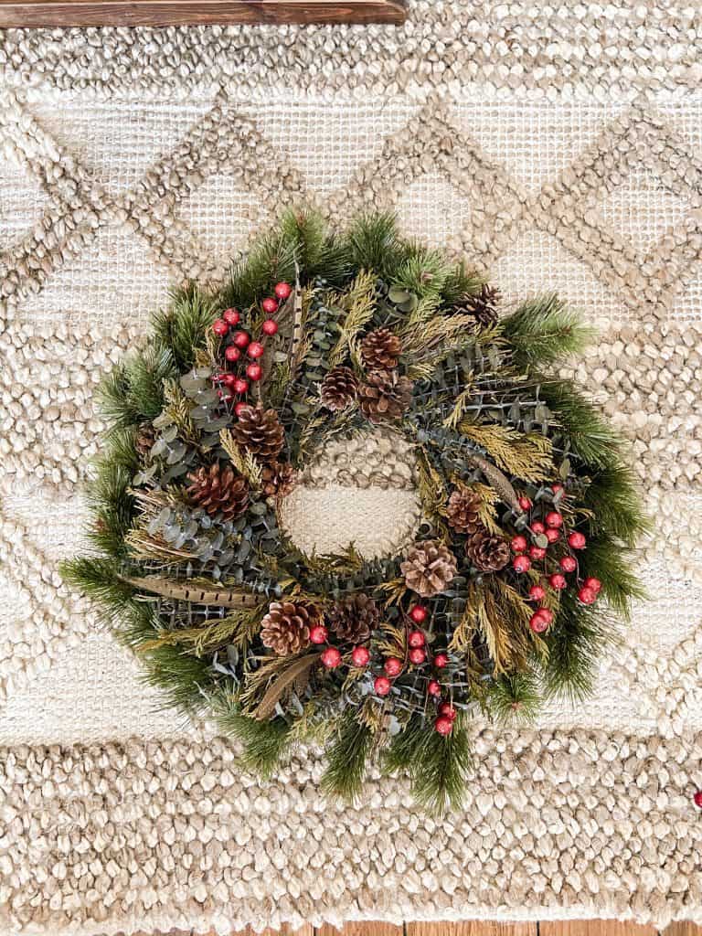 Beautiful Repurposed Christmas Wreath combines a new wreath with a thrift store wreath. 