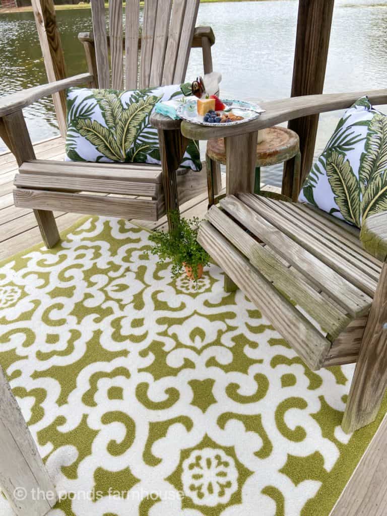 Materials for outdoor rugs with Adirondack chairs and fun pillows 