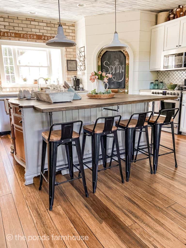 Barstool with low backs at DIY Kitchen Island with engineered bamboo flooring. 