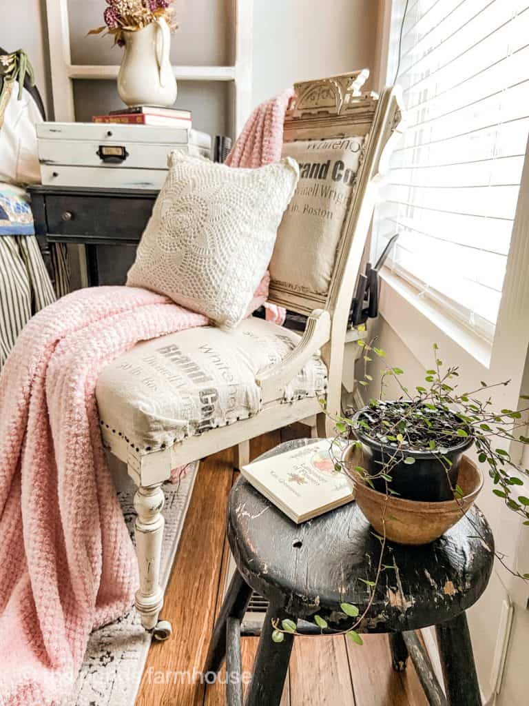 Antique Chair with drop cloth fabric cover is perfect bedside in guest bedroom.