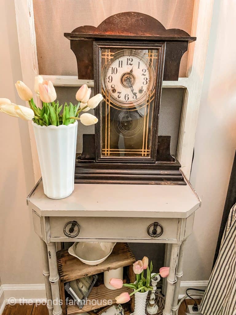 Inherited Antique Clock on bedside table in Guest Bedroom decorated for Spring. Antique Bedroom Decor