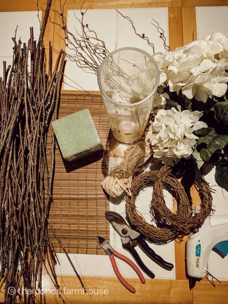Supplies to make a twig vase