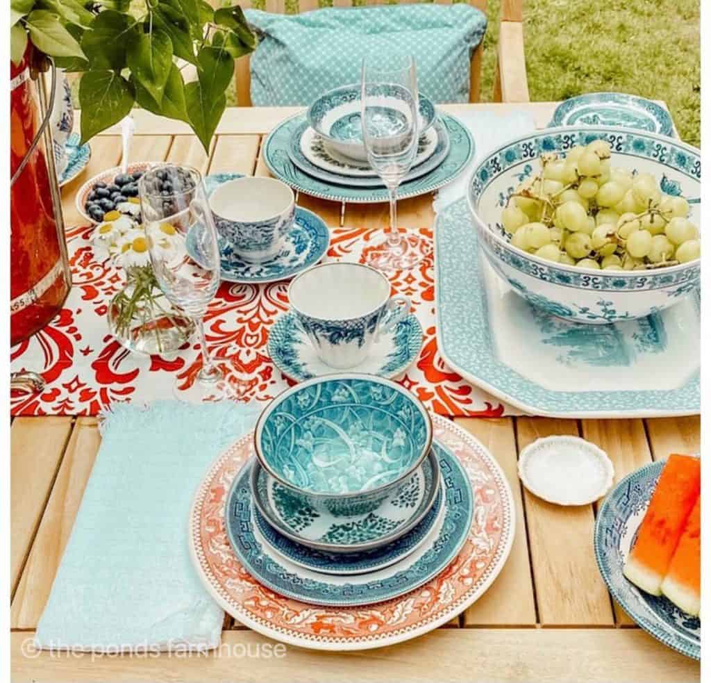Vintage red and blue dishes create a festive 4th of July tablescape.