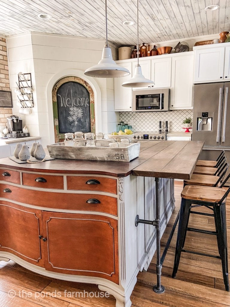 Modern farmhouse kitchen with DIY Island from repurposed furniture pieces.