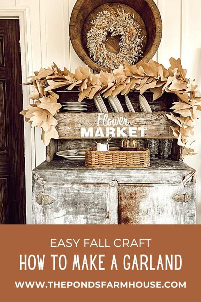 DIY Autumn Garland made with kraft paper for a cheap fall craft project.  