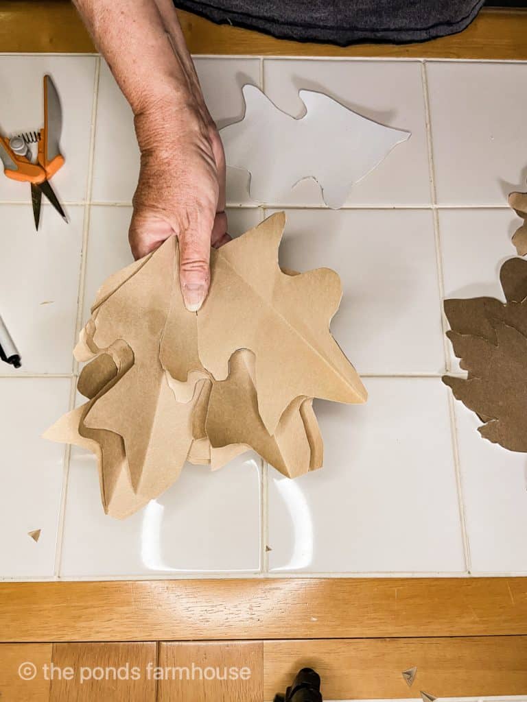 How to Make a Garland Fall Craft using craft paper for the leaves.