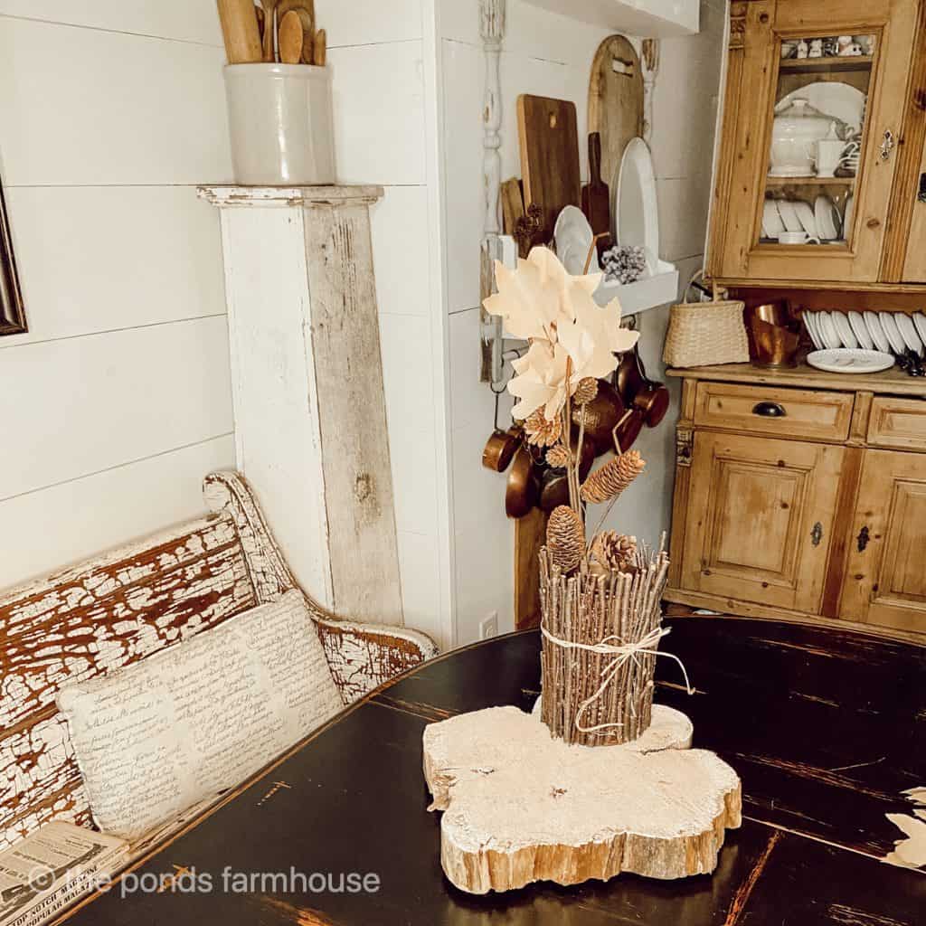 Begin adding pieces to table riser to create a fall centerpiece. Farmhouse and cottage decor.  