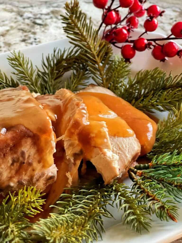 crock pot cranberry pork loin is an easy recipe for your Christmas Dinner Party.