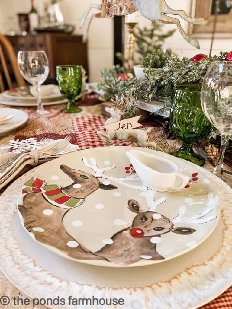Set your dinning room table with a reindeer inspired table setting in red, white and green.