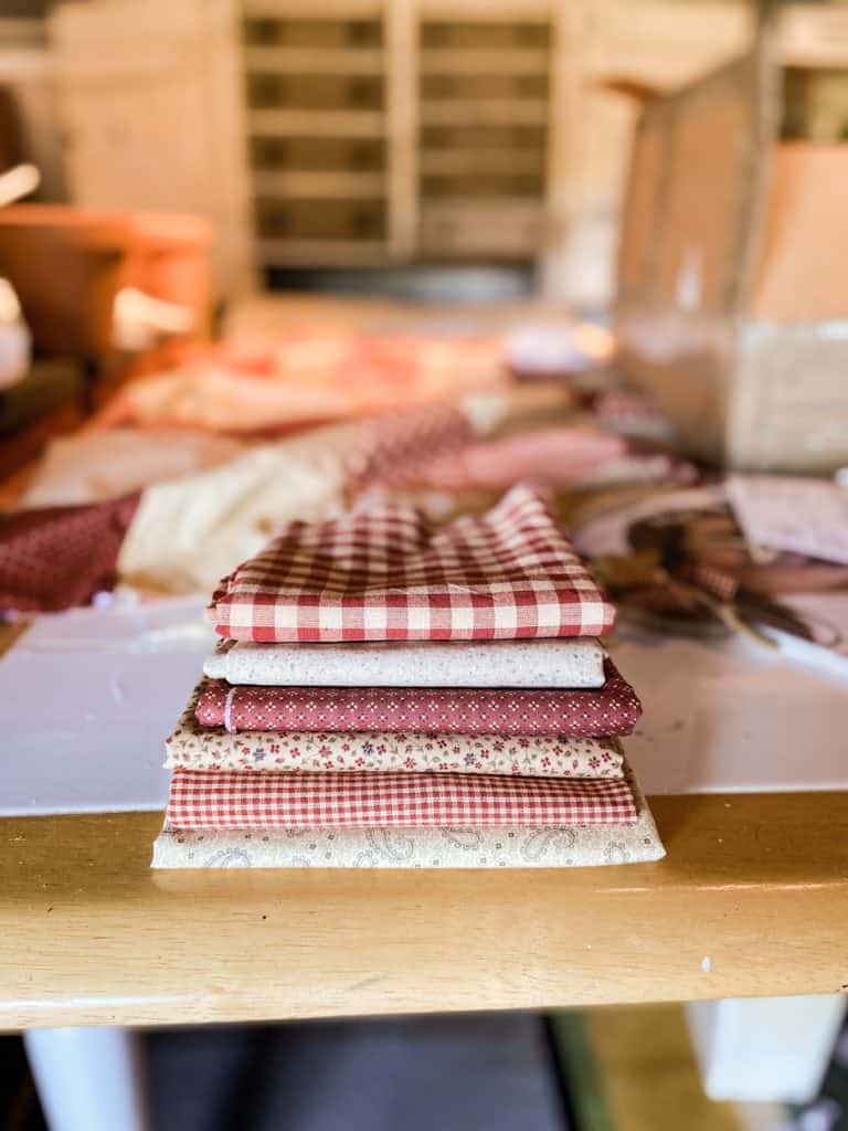 Materials for Christmas Tablecloth - Rustic, Vintage Inspired Fabrics to create a patchwork quilt design.
