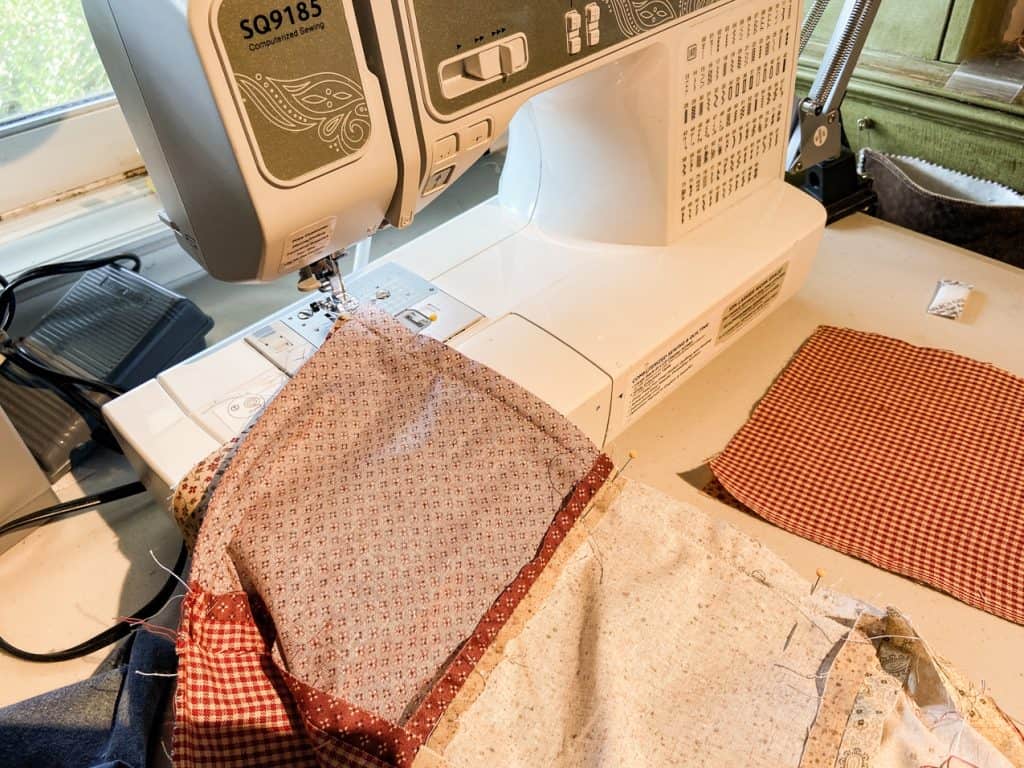 Sew tablecloth squares together