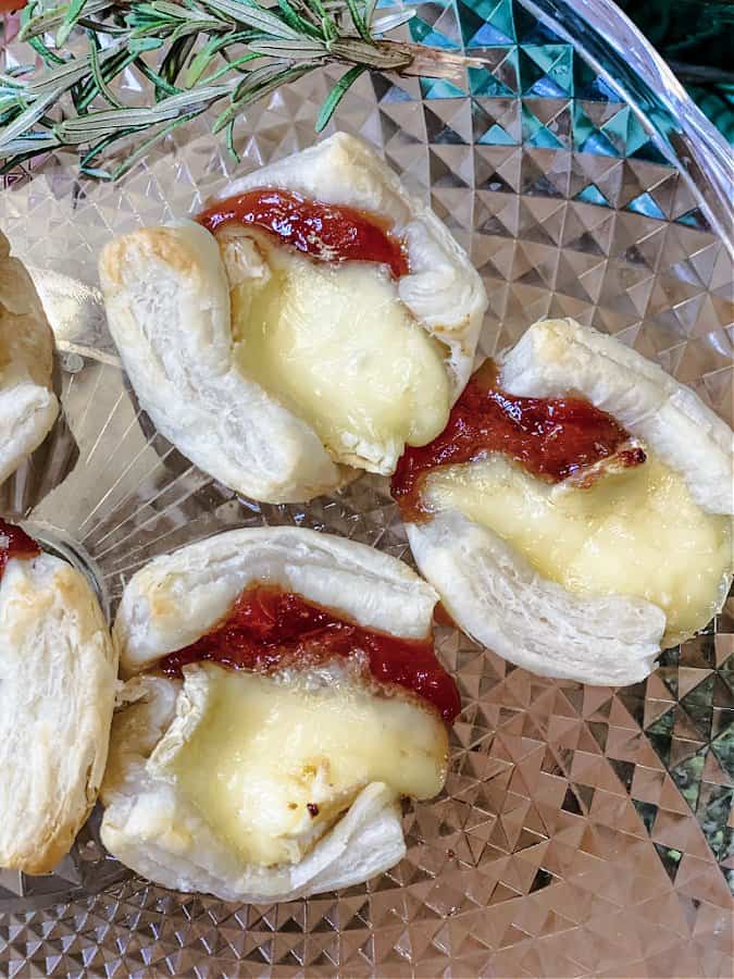 Strawberry Puffed Pastry Brie Bites make a great side dish or tasty appetizer for your holiday entertaining.