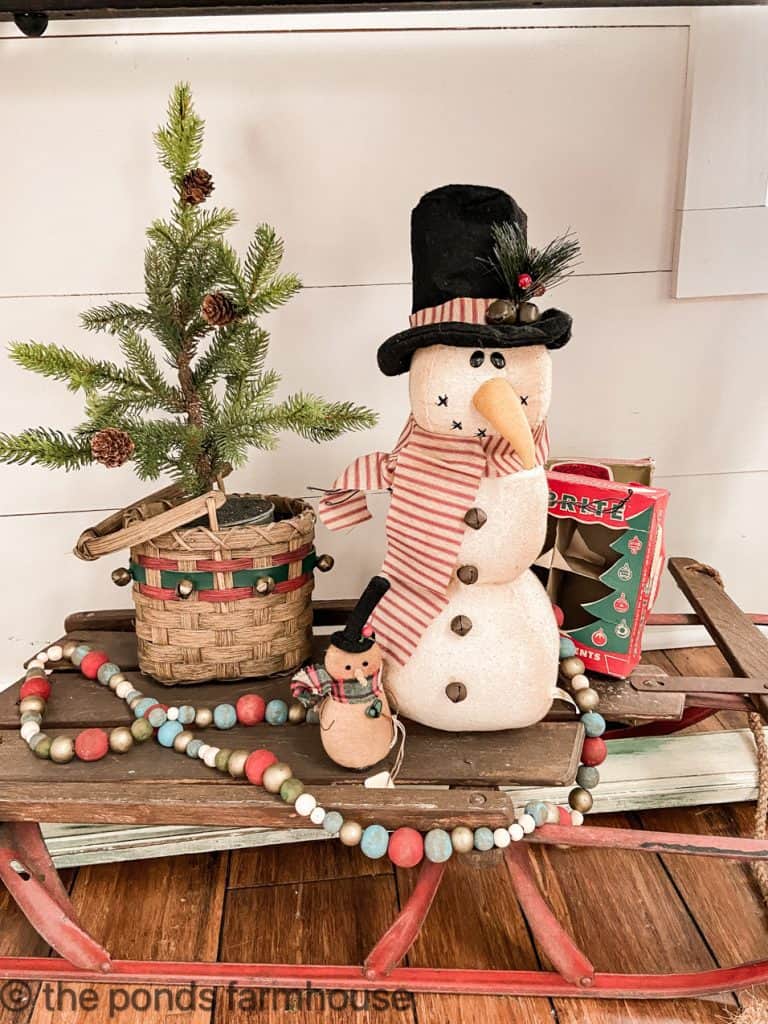 Vintage Christmas Decor with snowman and mini trees