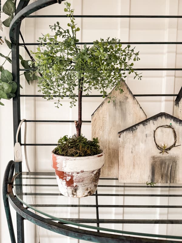 DIY Artificial Topiary in aged terra cotta pot on bakers rack. Farmhouse Style Decorating.