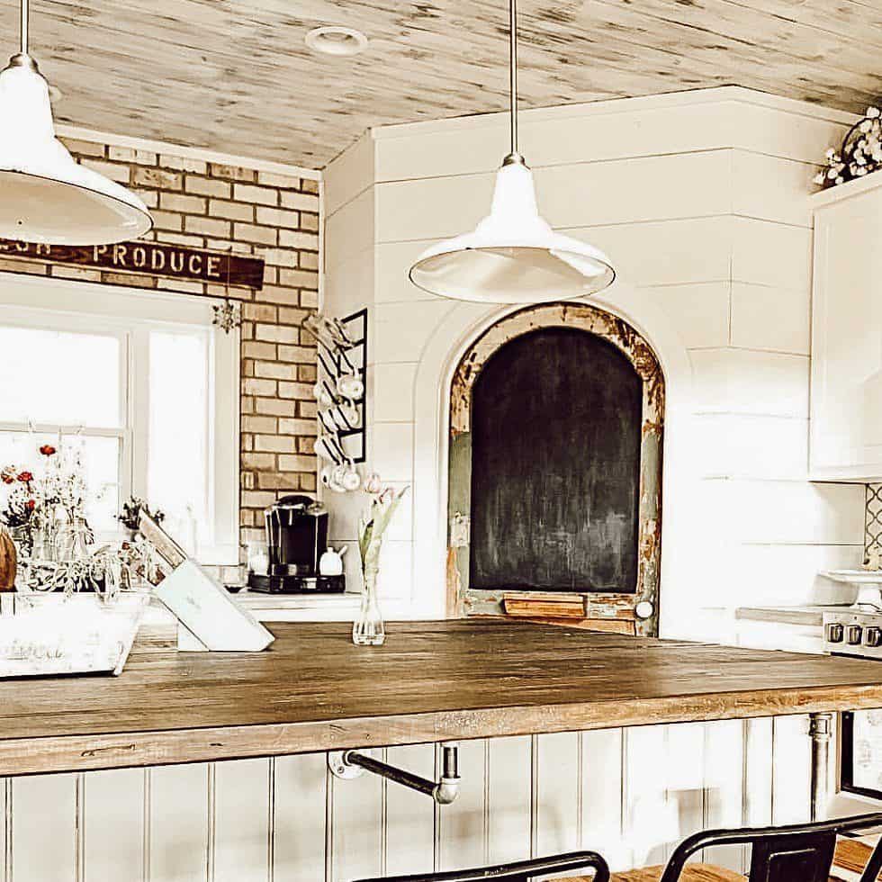 Re-purposed furniture and faux barn wood are the key to building your own kitchen island.  