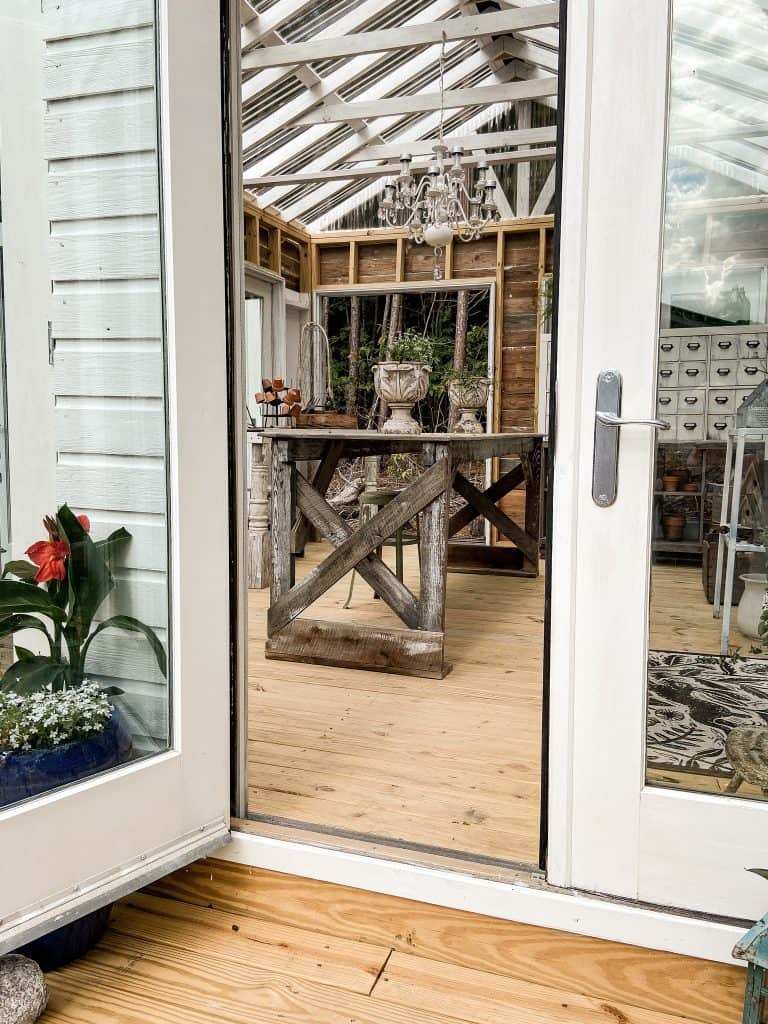 Installing the doors to open outward, allows the interior decor to remain in place and allow great air flow for the Greenhouse.  