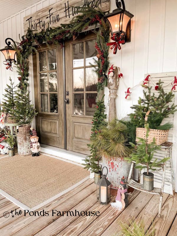 Christmas Past - Christmas Porch 2019 - with multiple trees and garlands