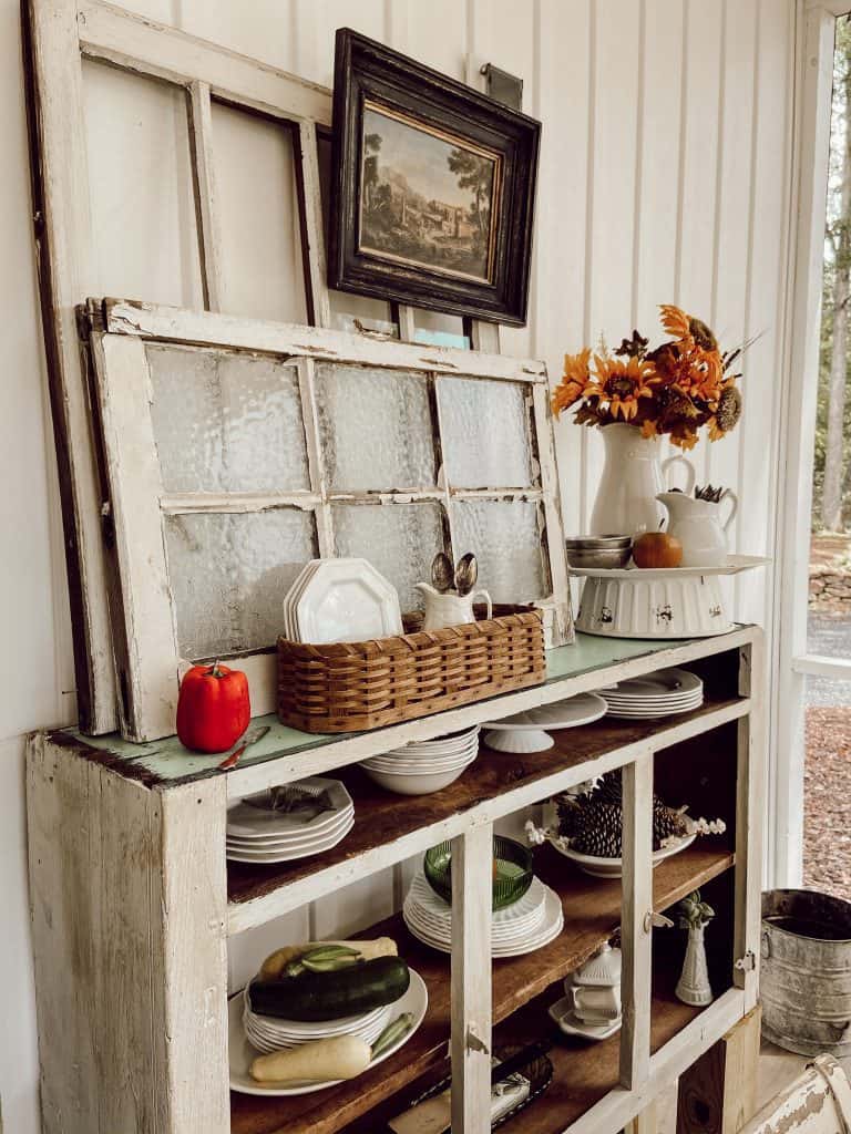 Add sunflowers and fresh garden veggies add a punch of color to this late summer tablescape