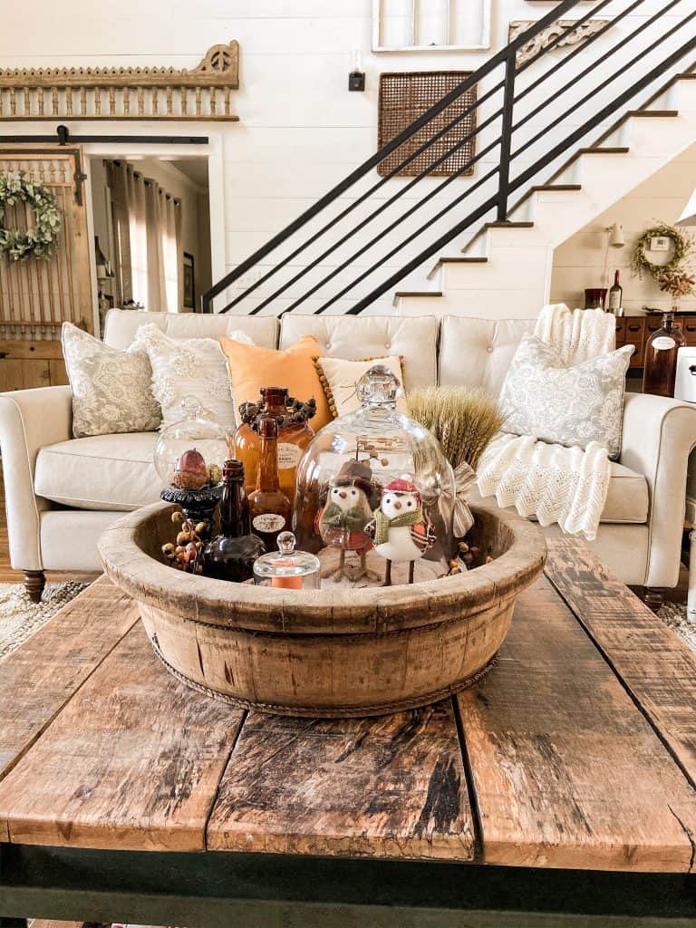 Wait until you see all the ways you can decorate with glass cloches for this fall.  Combine cloches, amber bottles and more to create a beautiful fall vignette.  Rustic Farmhouse Style decorating