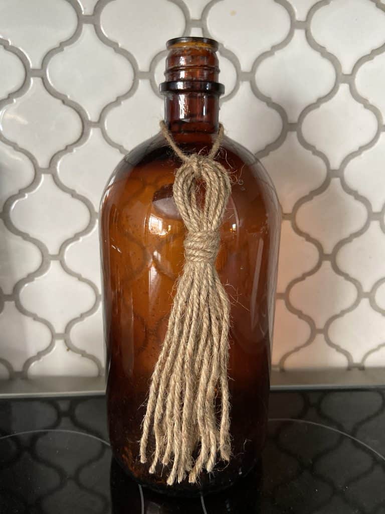 How to make DIY Jute Tassels to add  to  your home decor. Great for adding to table runners, pillows, gift packages, and more. 