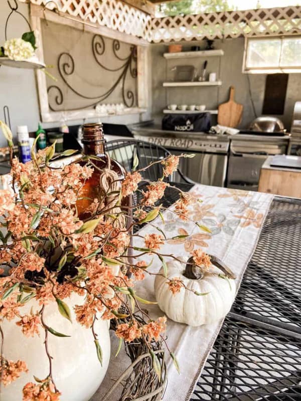 Upcycle Drop Cloth for Painting DIY Tablecloth Runner on Outdoor kitchen table.  