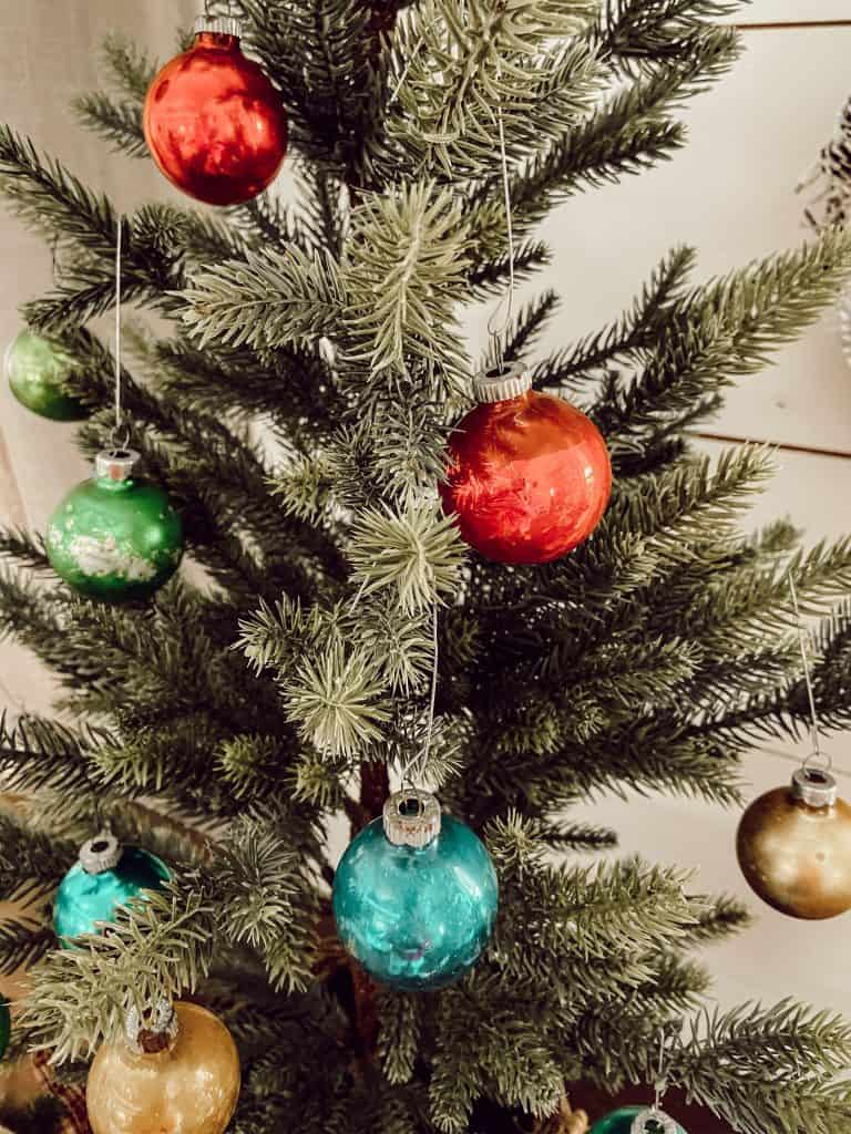 Make new ornaments look like vintage shiny brite ornaments with these easy instructions.