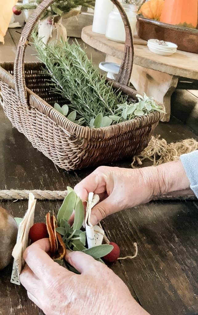 Add old book pages, colored wood beads, herbs and dried fruit to make a Christmas Garland.