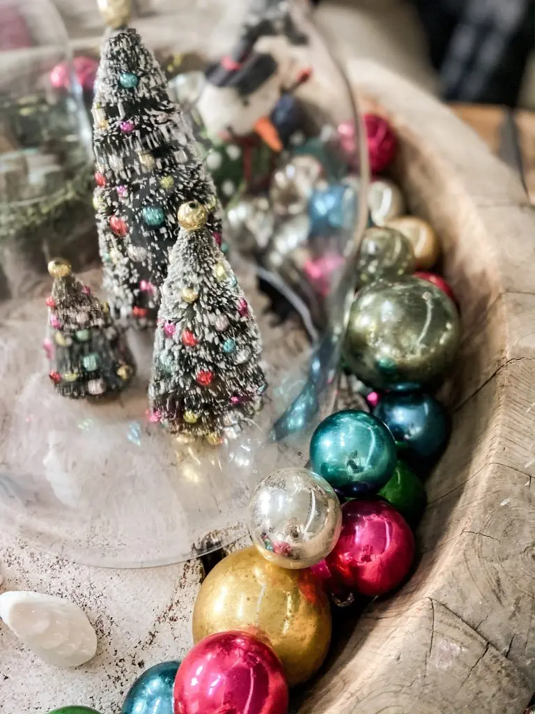 Bottle Brush Trees and Antique Shiny Brite ornaments fill a vintage European wooden bowl