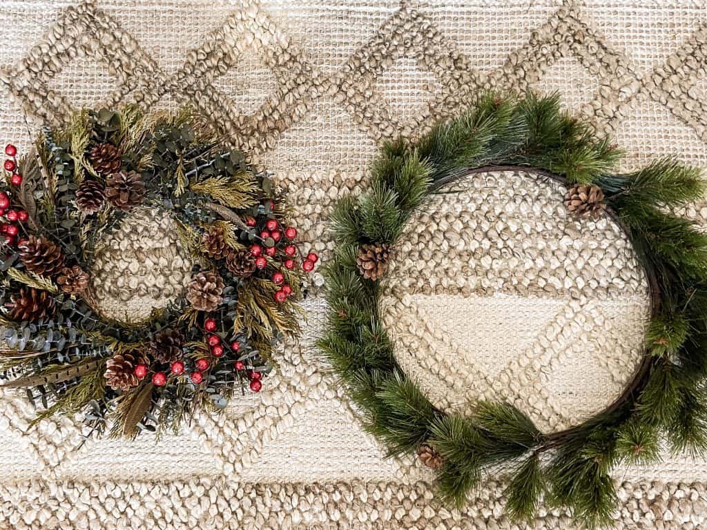 Combine a thrift store wreath with a smaller wreath for more impact.  Repurposed Christmas Decorating.