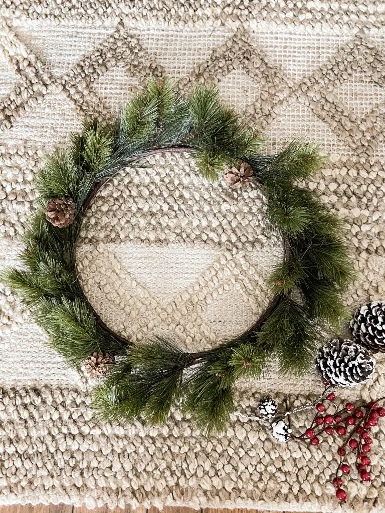 Combine a thrift store wreath with a smaller wreath for more impact.