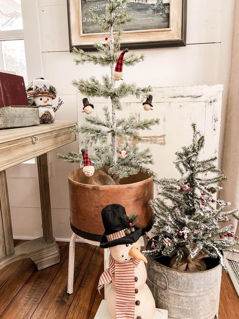 Because I love styling Christmas Trees so much, I'm sharing 15 Inspired Christmas Tree Ideas that I've used this year around the farmhouse.  See unique ways to decorate with trees through out your home.  DIY Projects, creative styling ideas, vintage inspired ideas and more.  