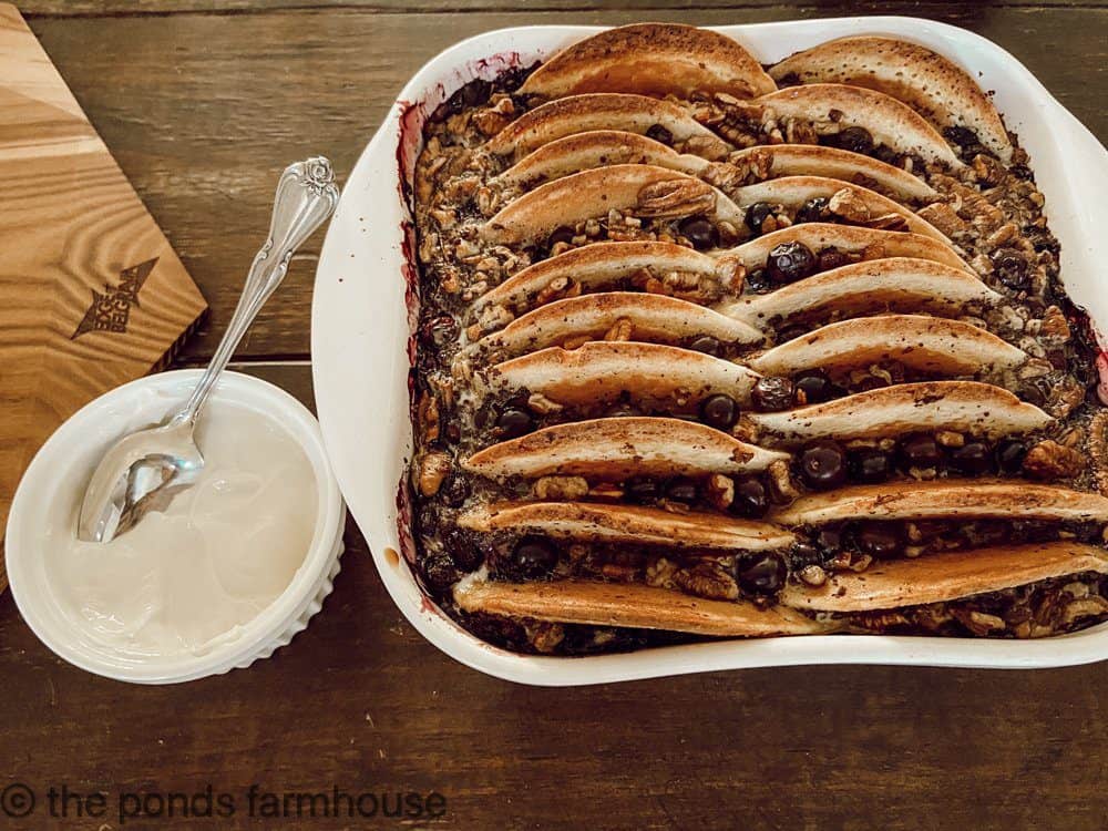 Delicious bread pudding made with pancakes, blueberries, and pecans.  optional sour cream and honey topping.