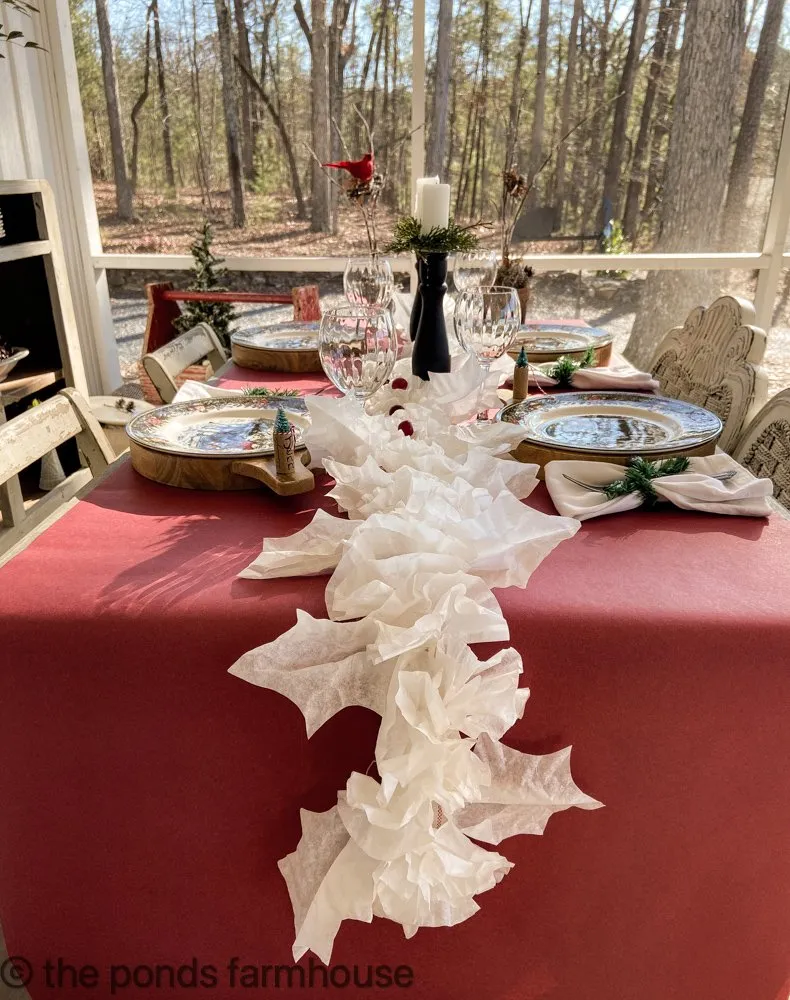 Coffee Filter Flower Table Runner with red craft paper table cloth for festive Christmas Tablescape