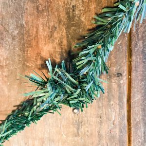 twist the cedar ties together to form a candle ring