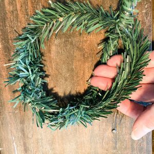 twist the cedar ties together to form a candle ring