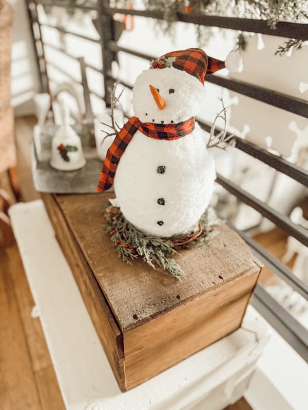 Snowman with a cedar candle ring 
