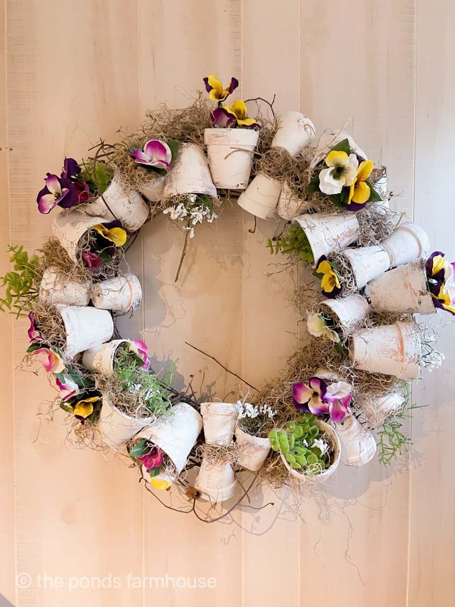 Spring DiY Wreath with terra cotta pots for Easter and Spring decorating.