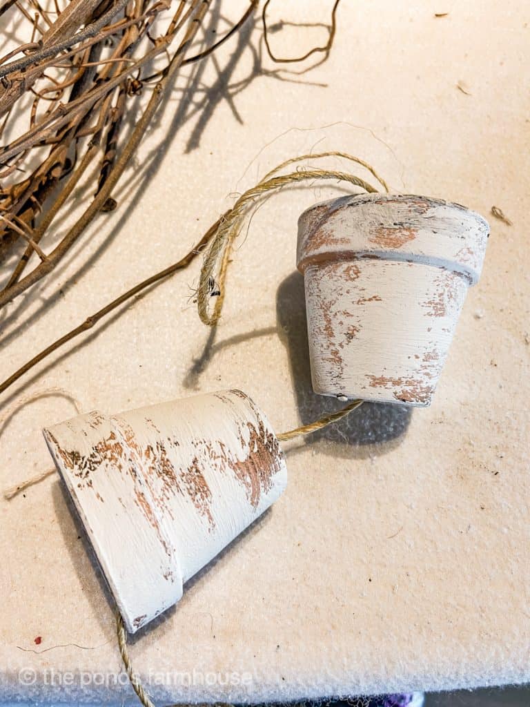 Sting clay pots on jute twine.  