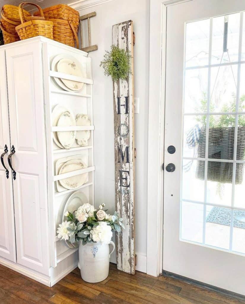 Decorate a DIY Plate Rack built onto the end of a cabinet with vintage and antique dishes and platters.