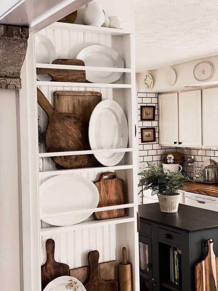 Decorate a DIY Plate Rack built onto the end of a cabinet with breadboards and ironstone.